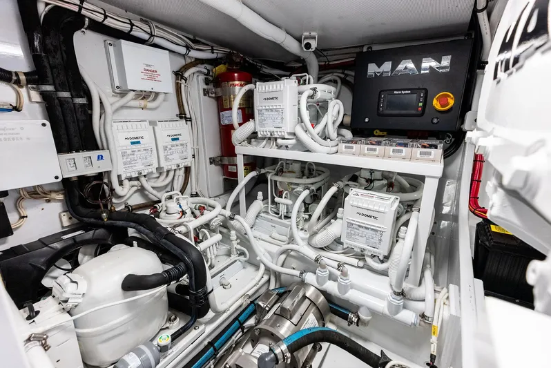 Rebel Yacht Photos Pics Engine room of a 2000 Rybovich Express with MAN engine.