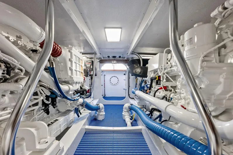 Rebel Yacht Photos Pics Engine room of a 2000 Rybovich Express yacht, clean and well-organized.