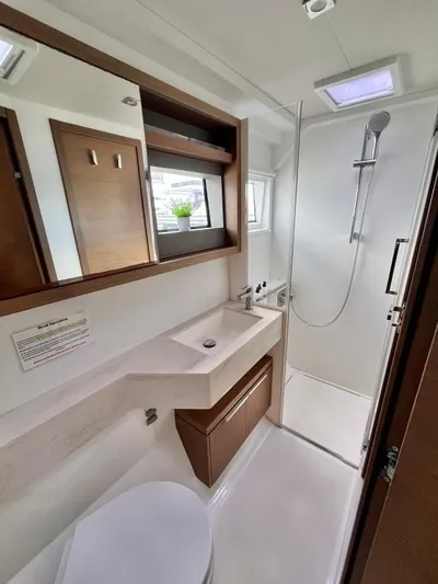 Out Of The Blue Yacht Photos Pics 2019 Lagoon 50 yacht bathroom with modern fixtures and shower.