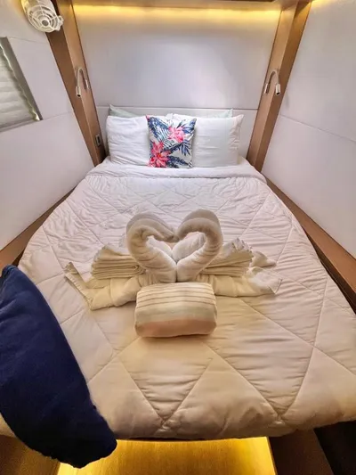 Out Of The Blue Yacht Photos Pics Luxurious cabin bed in 2019 Lagoon 50 yacht with elegant towel swans.