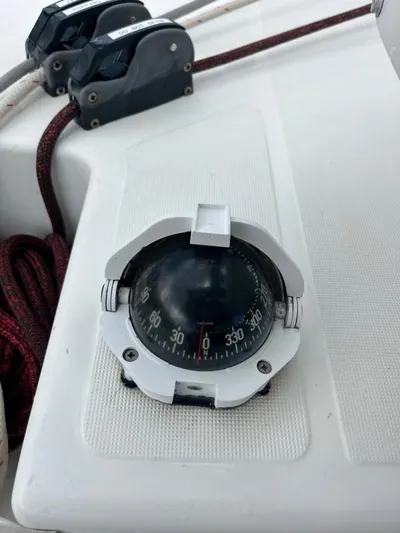 Out Of The Blue Yacht Photos Pics Compass on 2019 Lagoon 50 yacht deck with ropes and winches.