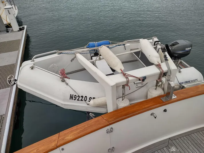 L' Espirit Yacht Photos Pics 1989 Ocean Alexander 440 CPMY with attached dinghy at dock.