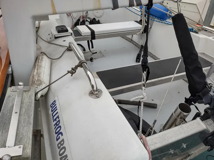 L' Espirit Yacht Photos Pics 1989 Ocean Alexander 440 CPMY boat deck with BULLFROG BOND label.