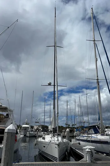 Vamoosh Yacht Photos Pics 2012 X-Yachts XP-44 sailboat docked at marina under cloudy sky.