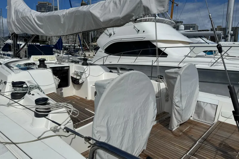 Vamoosh Yacht Photos Pics Sailing yacht X-Yachts XP-44, 2012 model, docked with covered cockpit and winches.