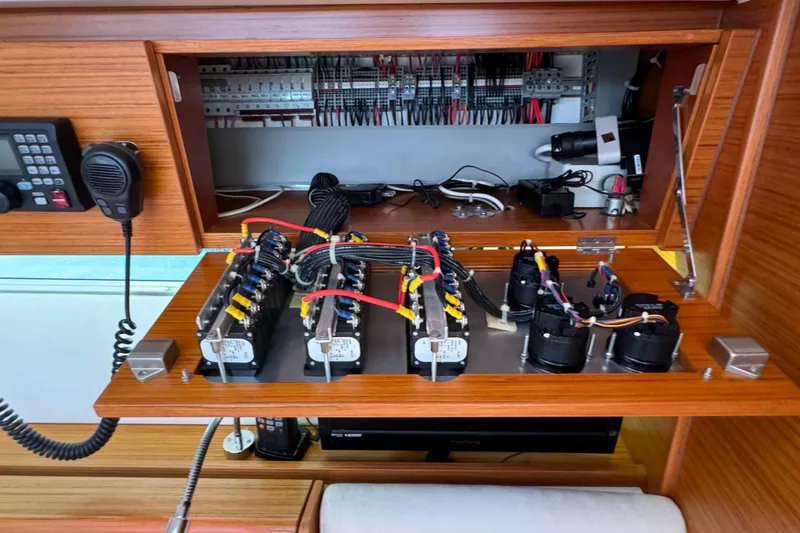 Vamoosh Yacht Photos Pics Electrical panel of 2012 X-Yachts XP-44, showcasing wiring and components.