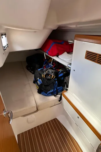 Vamoosh Yacht Photos Pics 2012 X-Yachts XP-44 cabin with storage bags and wooden flooring.