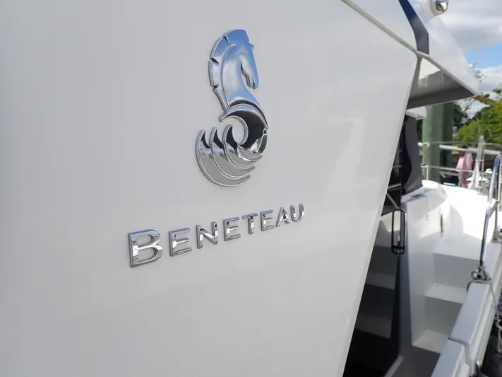 Blue Bird Yacht Photos Pics 2017 Beneteau Swift Trawler 30, close-up of logo on white hull.