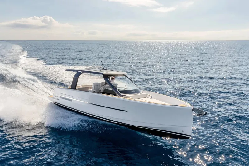  Yacht Photos Pics 2026 Fjord 39 XL yacht cruising on open sea under clear sky.