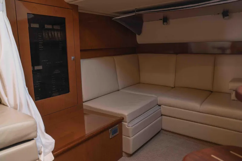  Yacht Photos Pics Luxurious interior of 2008 Sea Ray 38 Sundancer yacht with beige leather seating.