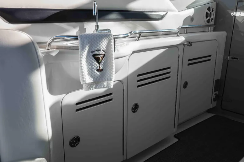  Yacht Photos Pics 2008 Sea Ray 38 Sundancer yacht interior with sleek cabinetry and towel detail.