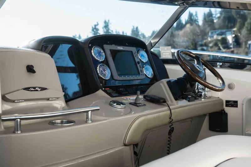  Yacht Photos Pics 2008 Sea Ray 38 Sundancer helm with modern controls and navigation system.