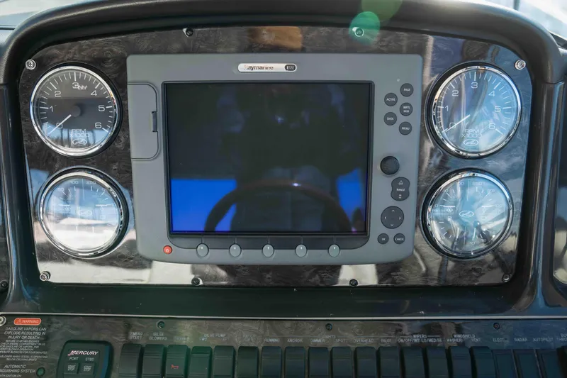  Yacht Photos Pics Dashboard of 2008 Sea Ray 38 Sundancer with gauges and navigation display.