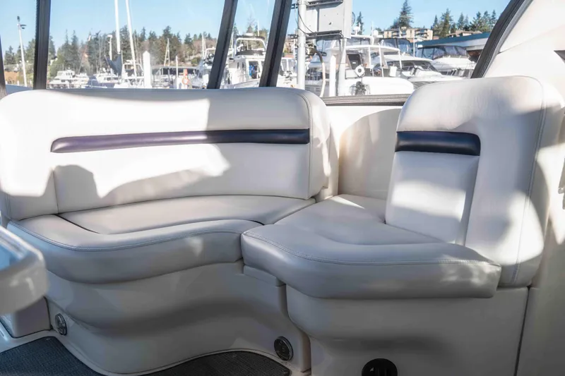  Yacht Photos Pics Luxurious seating on a 2008 Sea Ray 38 Sundancer yacht, docked at a marina.