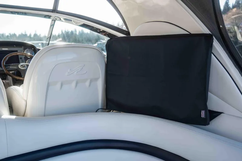  Yacht Photos Pics Interior of 2008 Sea Ray 38 Sundancer boat with white seating and black cover.