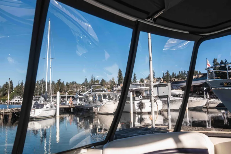  Yacht Photos Pics View from a 2008 Sea Ray 38 Sundancer at a marina with boats and clear skies.