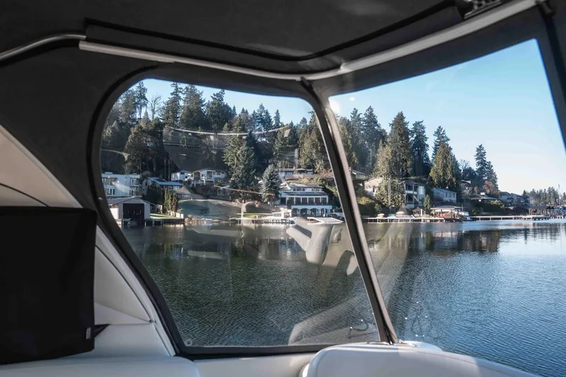  Yacht Photos Pics View from 2008 Sea Ray 38 Sundancer, overlooking serene waterfront homes and trees.