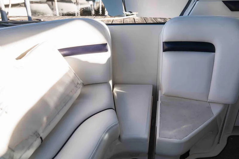  Yacht Photos Pics 2008 Sea Ray 38 Sundancer interior seating with white upholstery and dark accents.