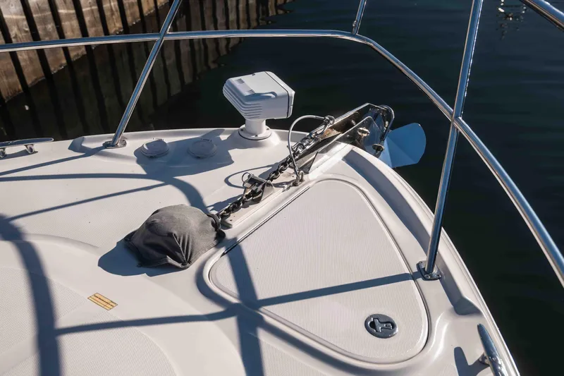  Yacht Photos Pics Bow of 2008 Sea Ray 38 Sundancer with anchor and railing in sunlight.