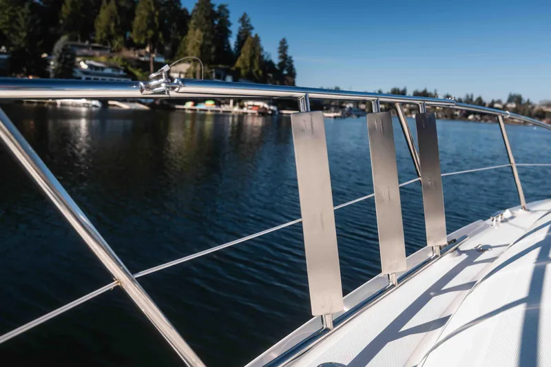  Yacht Photos Pics 2008 Sea Ray 38 Sundancer yacht railing with scenic lake view.