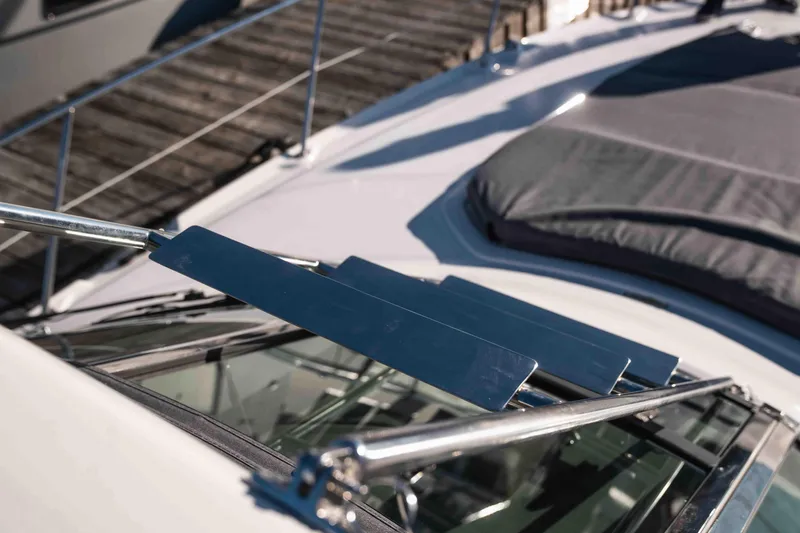  Yacht Photos Pics 2008 Sea Ray 38 Sundancer yacht deck with metal railings and covered seating area.