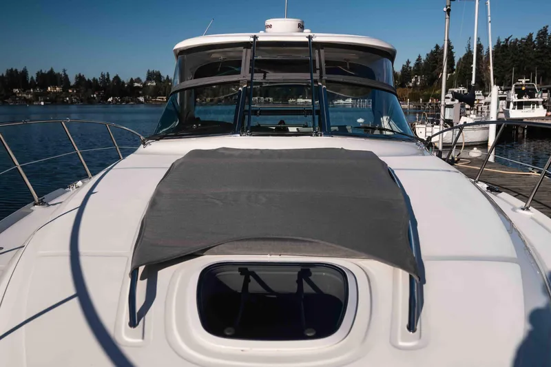  Yacht Photos Pics 2008 Sea Ray 38 Sundancer yacht docked in a serene marina setting.