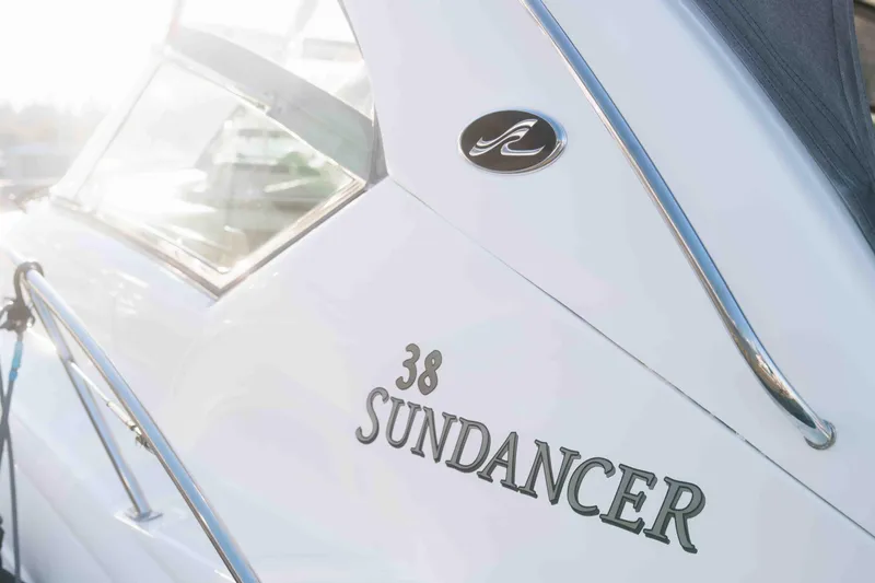  Yacht Photos Pics 2008 Sea Ray 38 Sundancer yacht, side view with logo and model name.