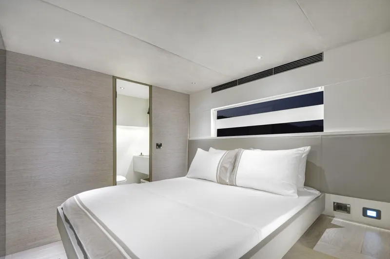 Mazu 62 Yacht Photos Pics Luxurious bedroom interior of 2025 Mazu Yachts 62, featuring modern design and elegant decor.