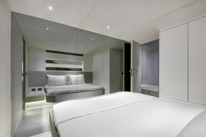 Mazu 62 Yacht Photos Pics Luxurious bedroom interior of 2025 Mazu Yachts 62, featuring modern design and elegant furnishings.