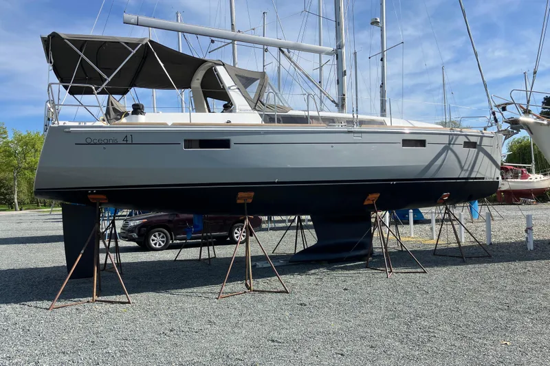  Yacht Photos Pics Sailboat on stands, Beneteau Oceanis 41, 2014 model, in a boatyard setting.