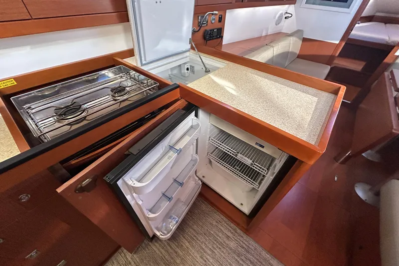  Yacht Photos Pics Galley of 2014 Beneteau Oceanis 41 with stove, fridge, and countertop.