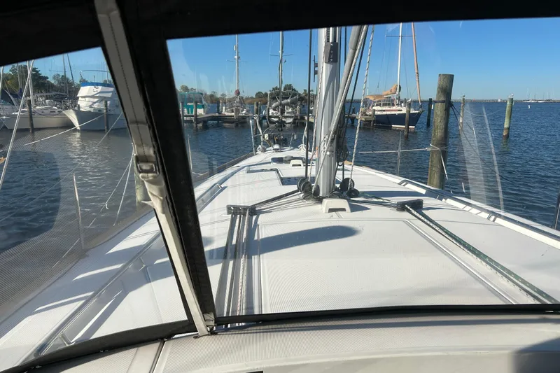  Yacht Photos Pics Beneteau Oceanis 41 sailboat docked at marina, view from cockpit, 2014 model.