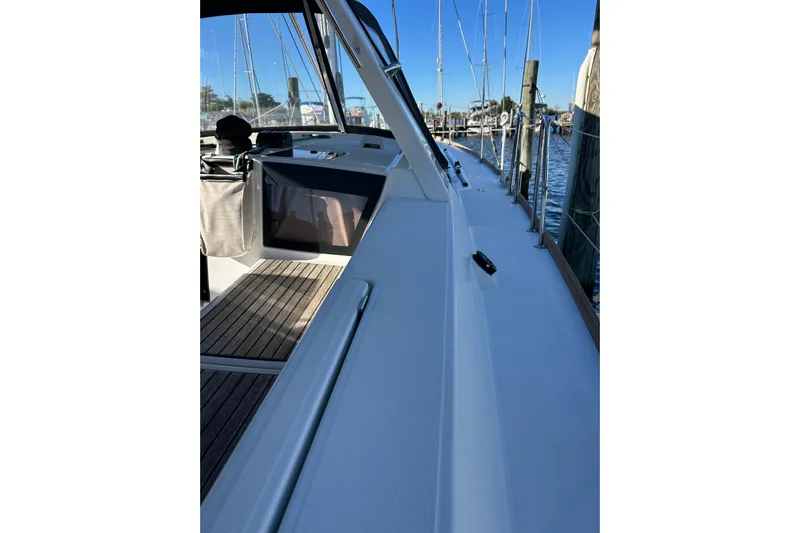  Yacht Photos Pics 2014 Beneteau Oceanis 41 sailboat deck with marina view.