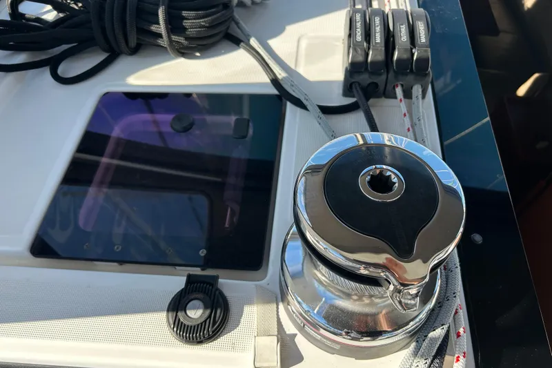  Yacht Photos Pics Close-up of Beneteau Oceanis 41 sailboat winch and control panel, 2014 model.