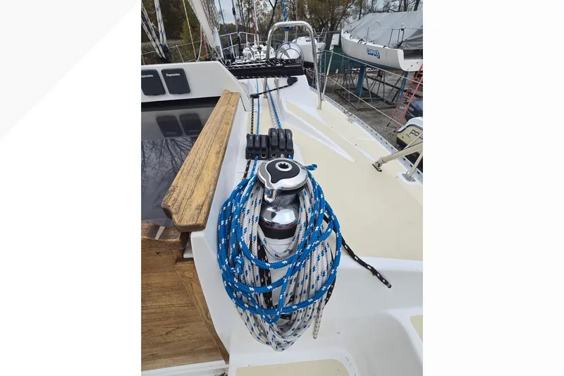 Irie Yacht Photos Pics 2018 Tartan 345 sailboat deck with winch and blue ropes.