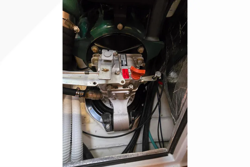 Irie Yacht Photos Pics Engine compartment of a 2018 Tartan 345 sailboat, showcasing mechanical components.