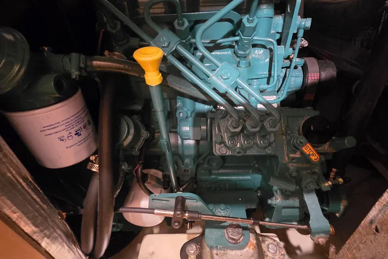 Irie Yacht Photos Pics Engine compartment of a 2018 Tartan 345, showcasing mechanical components and hoses.