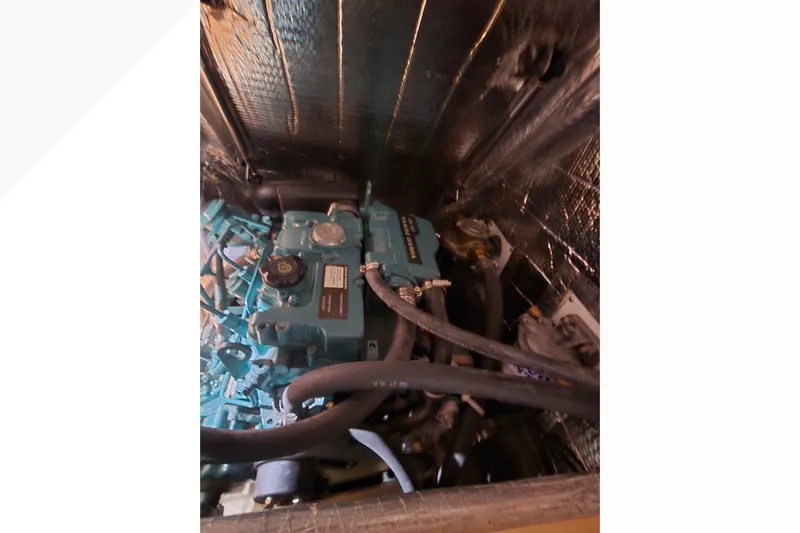 Irie Yacht Photos Pics Engine compartment of a 2018 Tartan 345 sailboat, featuring a compact marine engine.