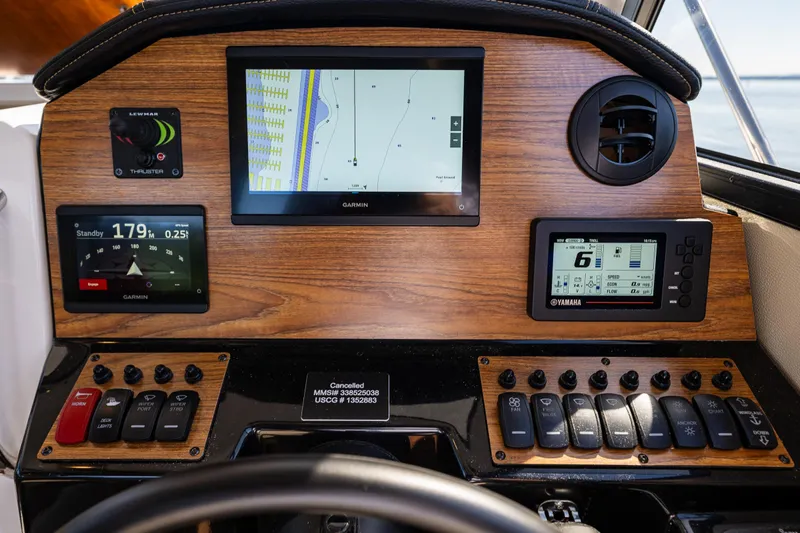 Cancelled Yacht Photos Pics 2024 Cutwater C-248 Coupe dashboard with Garmin navigation and Yamaha control displays.