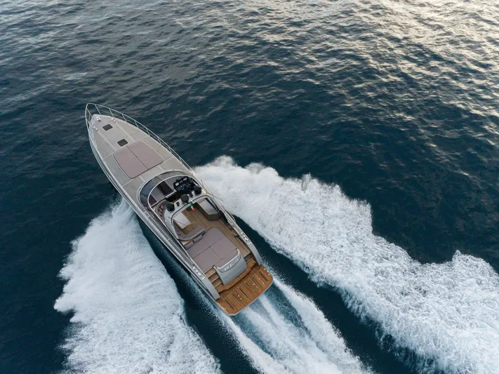  Yacht Photos Pics 2024 Rizzardi GR SESSANTATRE luxury yacht cruising on open water.