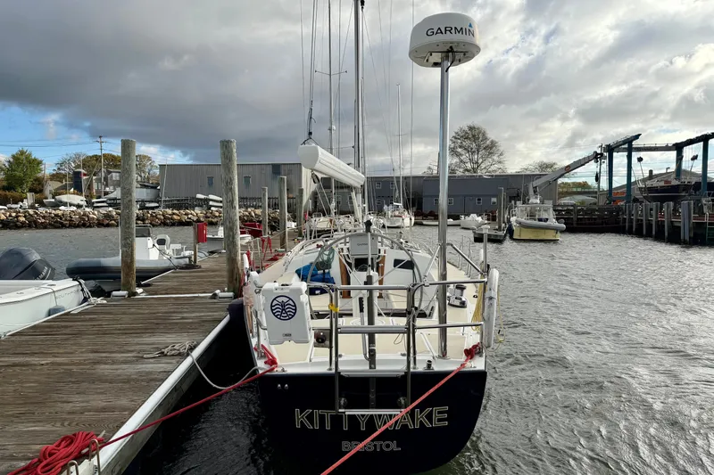 Kittywake Yacht Photos Pics 1996 J Boats J/42 sailboat docked at marina with overcast sky.