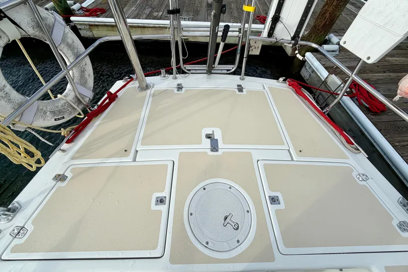 Kittywake Yacht Photos Pics 1996 J Boats J/42 sailboat deck with storage hatches and safety equipment.