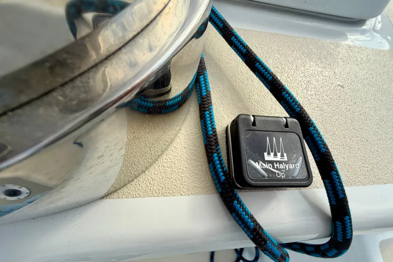 Kittywake Yacht Photos Pics Main halyard control on 1996 J Boats J/42 sailboat with blue and black rope.