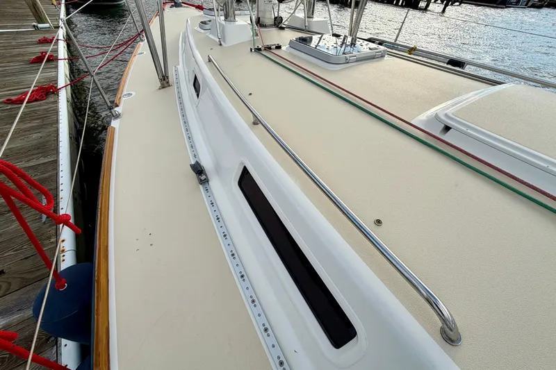 Kittywake Yacht Photos Pics Deck view of a 1996 J Boats J/42 sailboat docked with red ropes.