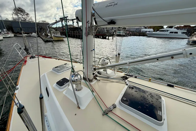 Kittywake Yacht Photos Pics 1996 J Boats J/42 sailboat deck with rigging, docked in a marina.