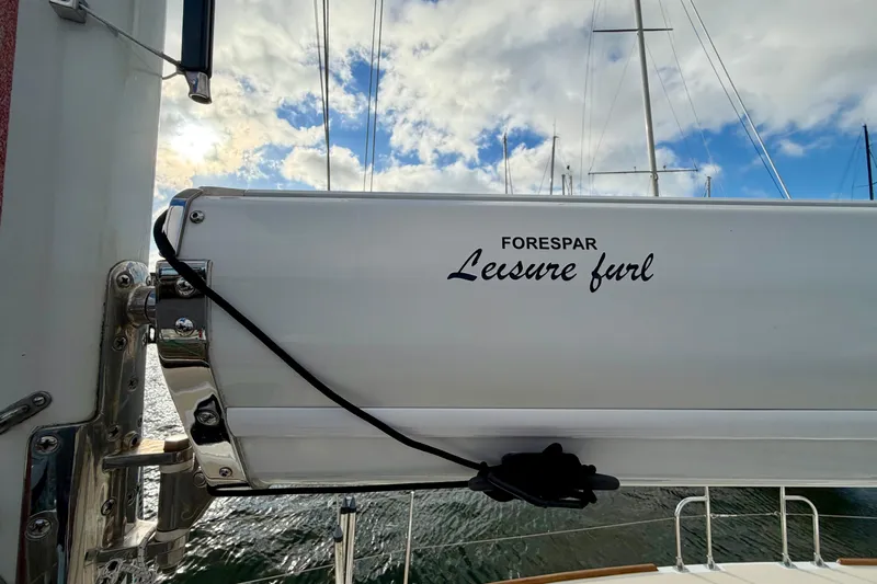 Kittywake Yacht Photos Pics Forespar Leisure Furl system on 1996 J Boats J/42 sailboat under a cloudy sky.