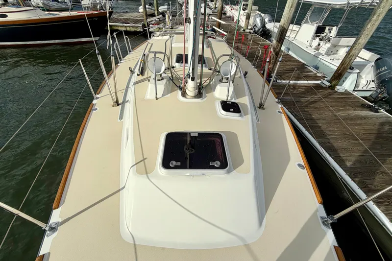 Kittywake Yacht Photos Pics 1996 J Boats J/42 sailboat deck view at marina, showcasing sleek design and rigging.