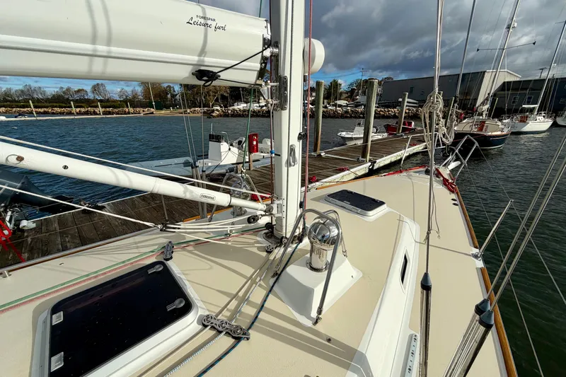 Kittywake Yacht Photos Pics 1996 J Boats J/42 sailboat docked at marina, showcasing deck and rigging.