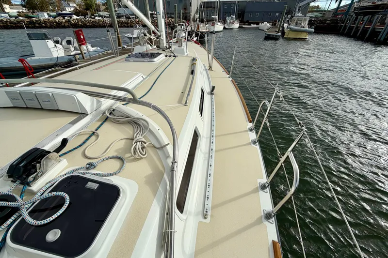 Kittywake Yacht Photos Pics Deck view of a 1996 J Boats J/42 sailboat docked in a marina.