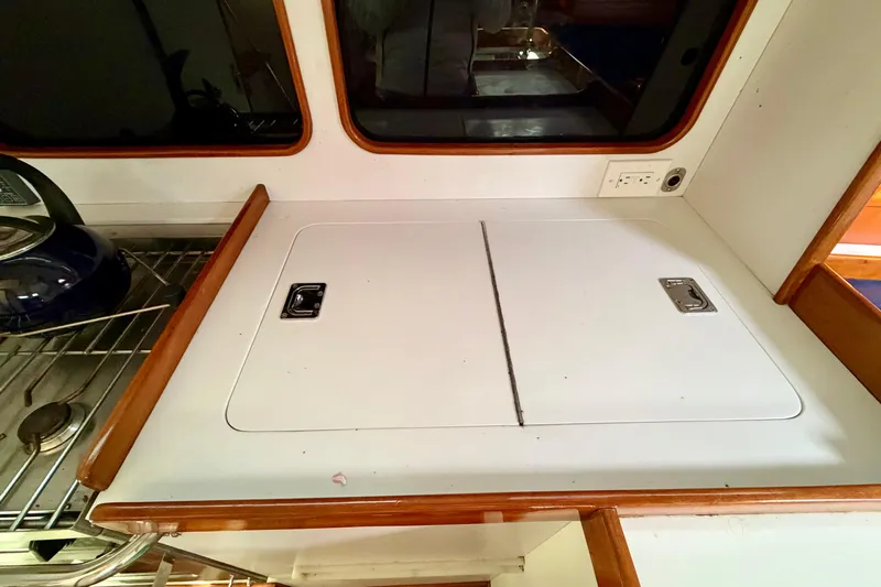 Kittywake Yacht Photos Pics Interior of 1996 J Boats J/42 yacht showing kitchen counter and stove area.